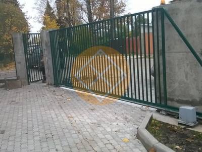 Решетчатые откатные ворота с зеленым окрасом